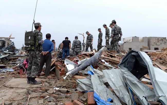 Teacher recalls battle with tornado that killed 98 in China | iNFOnews.ca
