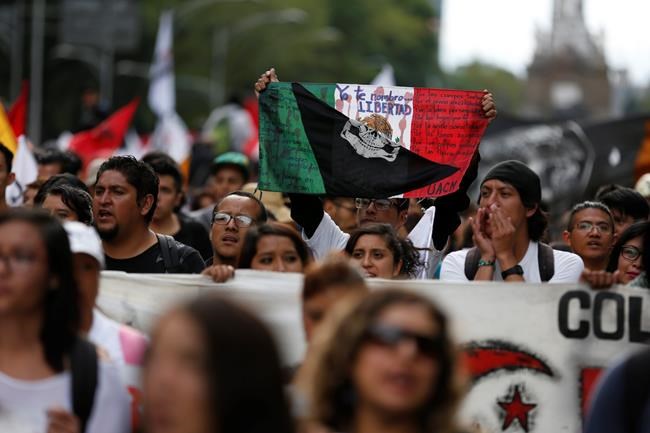 Families of missing 43 students lead march in Mexico | iNFOnews.ca
