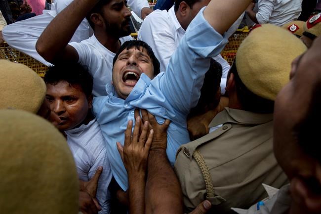 India's accused minister files defamation suit amid protests | iNFOnews.ca