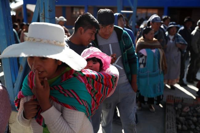The Latest: Morales leads Bolivia vote, but runoff likely | iNFOnews.ca CP1742993287
