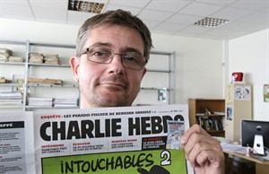 Charlie Hebdo massacre shows clash of globalization and ideologies raises stakes for satirists | iNFOnews.ca CP31448178