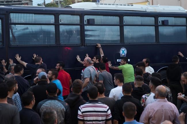 Greek island protest about migrant influx turns violent | iNFOnews.ca