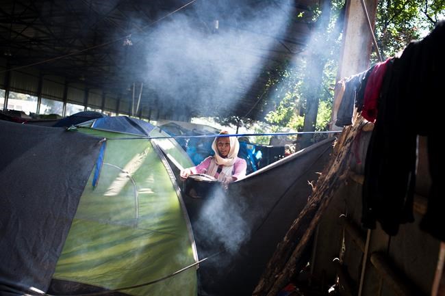 The Latest: Hungary allows tougher asylum-seeker conditions | iNFOnews.ca