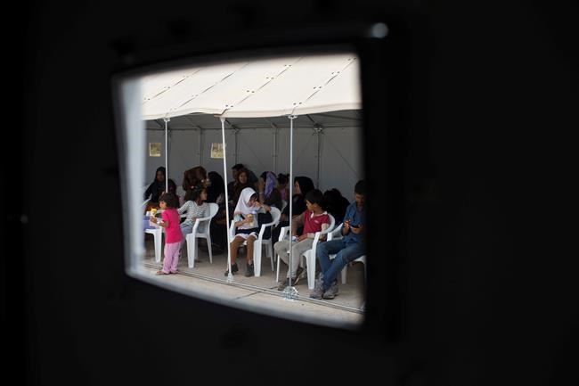 The Latest: Migrants found in Hungary taken to transit zones | iNFOnews.ca