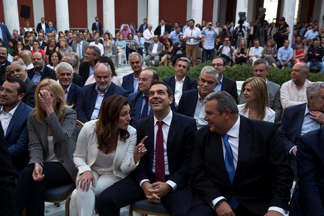 For once in a tie, Greek PM Tsipras hails new debt deal | iNFOnews.ca For once in a tie, Greek PM Tsipras hails new debt deal | iNFOnews.ca