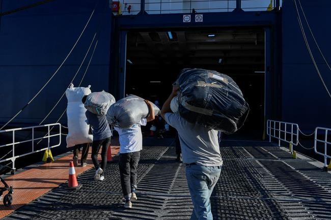 The Latest: Greece moves 570 migrants from overcrowded camp | iNFOnews.ca