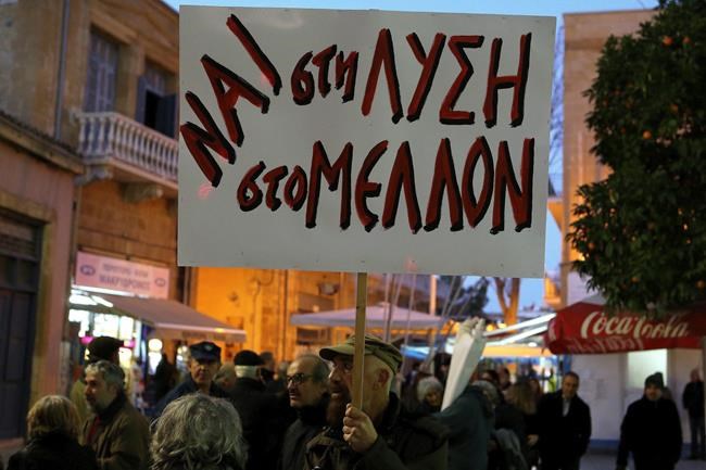 Dozens march for peace deal in ethnically divided Cyprus | iNFOnews.ca Dozens march for peace deal in ethnically divided Cyprus | iNFOnews.ca
