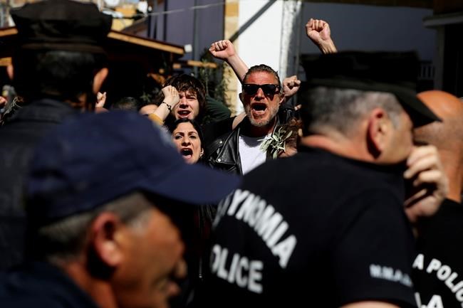 Cyprus police pepper spray protesters at shut crossing point | iNFOnews.ca