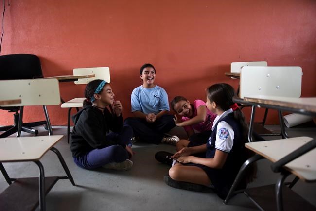 Puerto Rico youth stranded with school still out from storm | iNFOnews.ca CP968470821