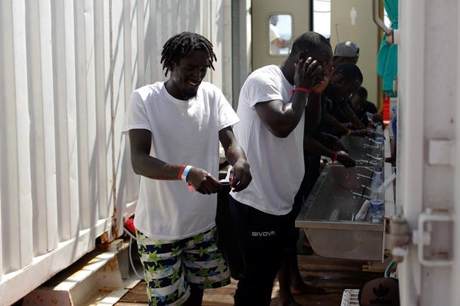 Pregnant woman evacuated off migrant ship by helicopter | iNFOnews.ca