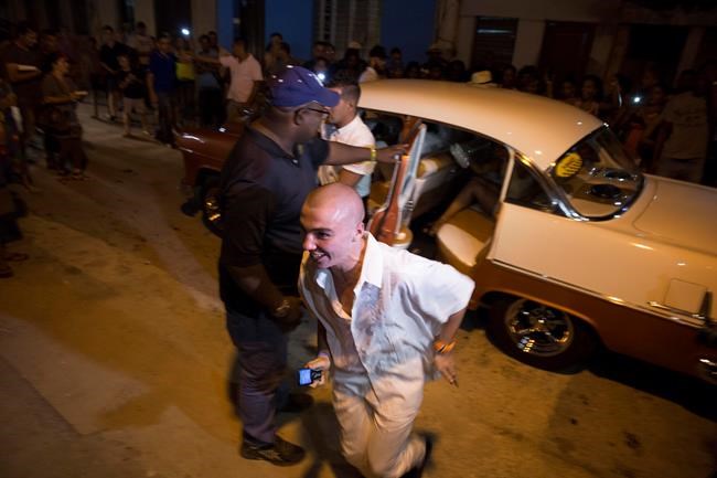 Madonna joins in the stream of celebrities visiting Cuba | iNFOnews.ca CP785337971