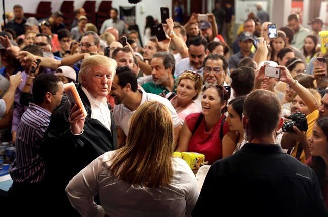 Trump sees 'miracle' Puerto Rico survival, ignores critics | iNFOnews.ca