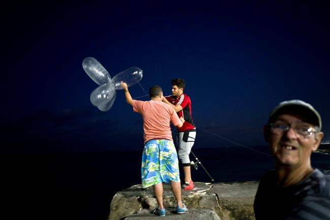 Inventive Cubans hunt expensive fish using inflated condoms | iNFOnews.ca CP1097191794