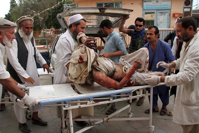 Officials: Blast at Afghan mosque kills 62 during prayers | iNFOnews.ca CP385431424