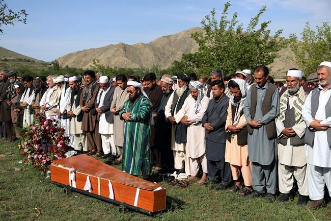 Thousands attend memorial for slain Afghan AFP photographer | iNFOnews.ca Thousands attend memorial for slain Afghan AFP photographer | iNFOnews.ca