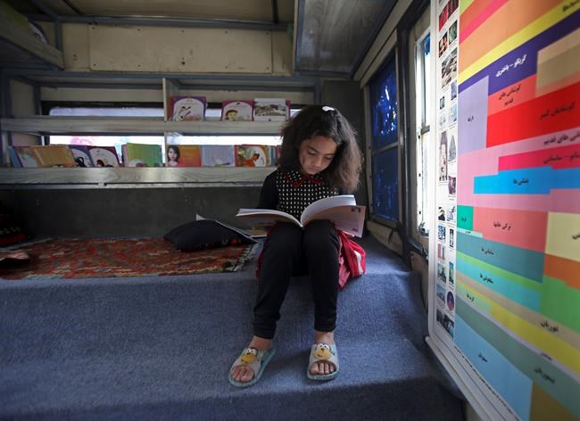 Library on wheels brings joy of books to Afghan kids | iNFOnews.ca CP172546393