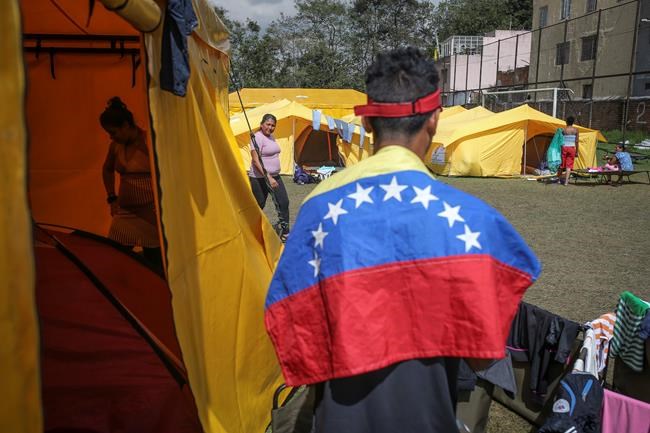 Colombia tries quashing tensions at migrant camp with soccer | iNFOnews.ca CP945009341