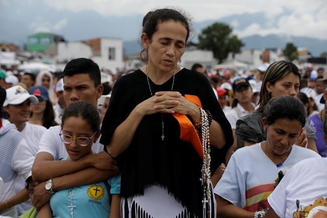 Pope embraces Colombian victims, ex-fighters in peace bid | iNFOnews.ca