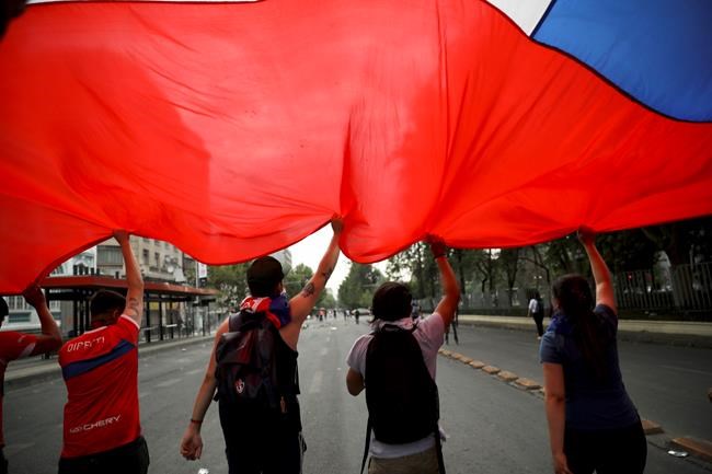 Protests rage in Chile despite president's reform promise | iNFOnews.ca