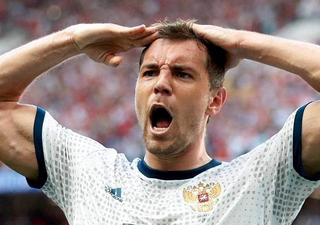 Host Russia extends World Cup party by eliminating Spain | iNFOnews.ca