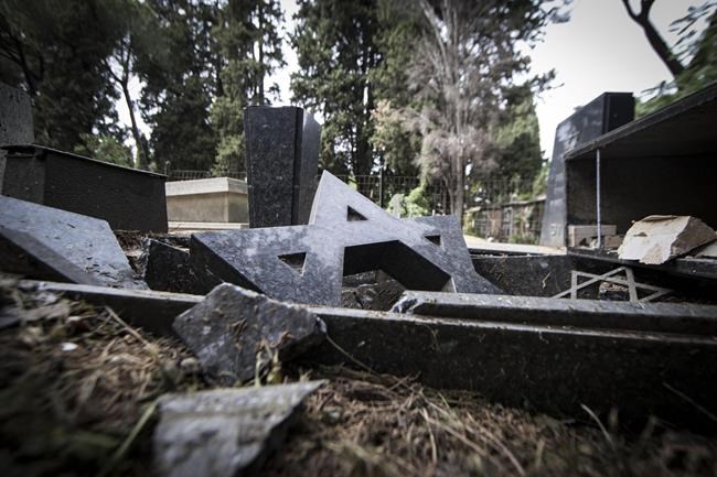 Nighttime vandals smash some 70 headstones at Rome cemetery | iNFOnews.ca