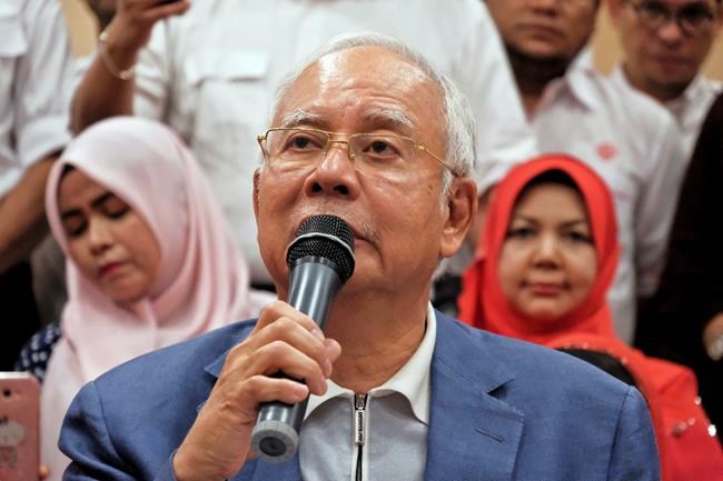 Malaysia bars scandal-ridden ex-leader from leaving country | iNFOnews.ca