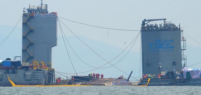 The Latest: Crews set to load ferry onto transport ship | iNFOnews.ca