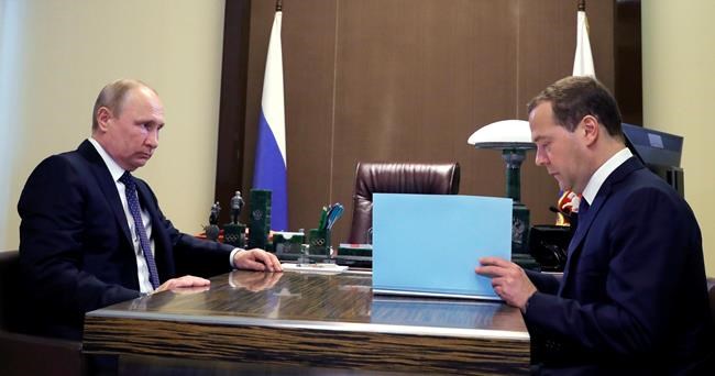Putin approves new Cabinet that sees key figures remain | iNFOnews.ca CP1836938560