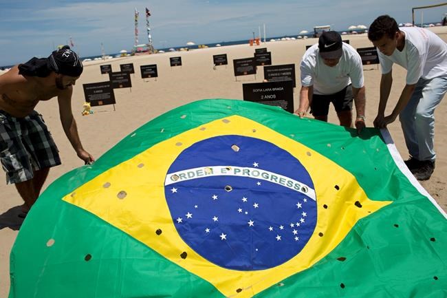 Tombstones on Rio beach for kids killed by stray bullets | iNFOnews.ca