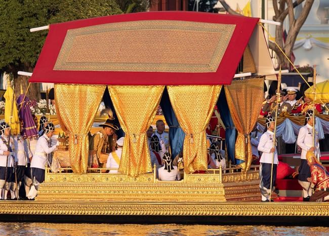 Thai king takes part in royal barge procession in Bangkok | iNFOnews.ca CP959026076