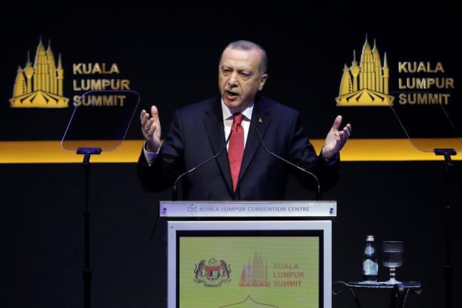 Turkish parliament OKs controversial Libya military deal | iNFOnews.ca CP1098666514