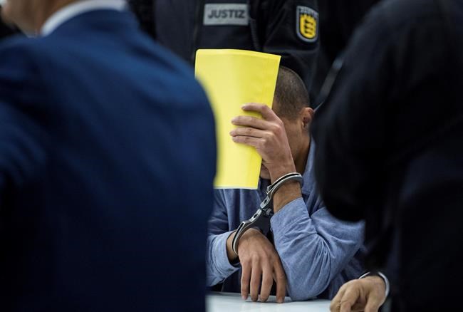 4 men accused of killings in Syria go on trial in Germany | iNFOnews.ca 4 men accused of killings in Syria go on trial in Germany | iNFOnews.ca