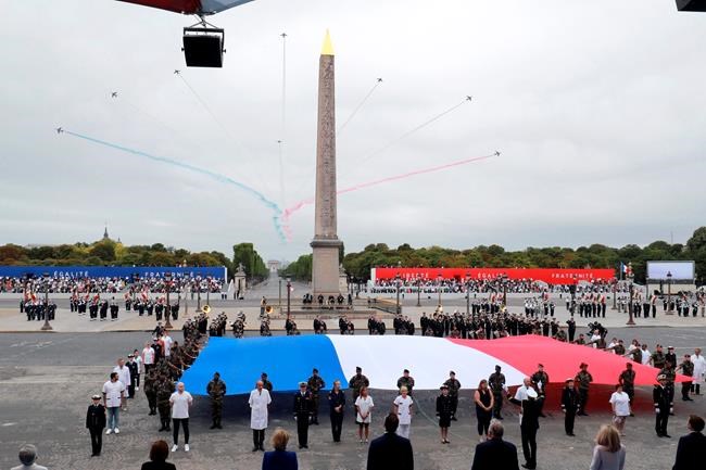 France says 'merci' to virus heroes on poignant Bastille Day | iNFOnews.ca France says 'merci' to virus heroes on poignant Bastille Day | iNFOnews.ca