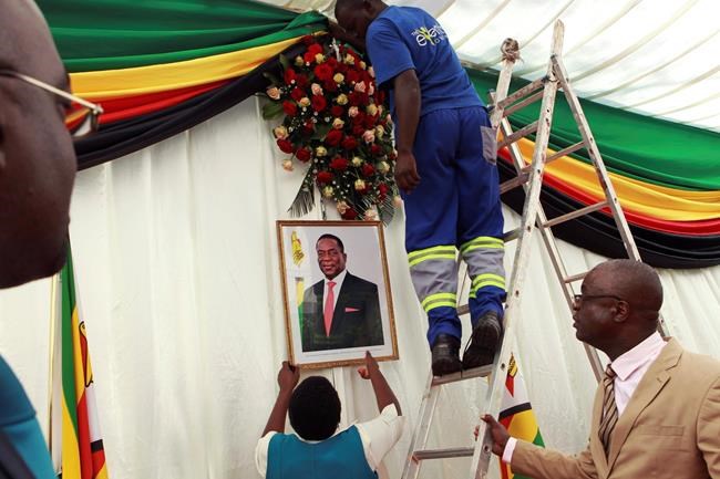 Zimbabwe's president swears in first post-Mugabe cabinet | iNFOnews.ca CP582227506