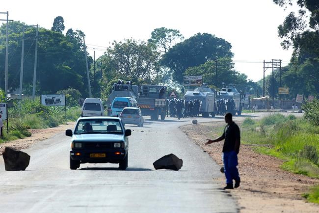 Police fire tear gas in Zimbabwe's capital at fuel protests | iNFOnews.ca CP986301489