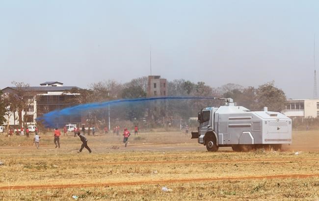 Zimbabwe police crush anti-government protest in capital | iNFOnews.ca