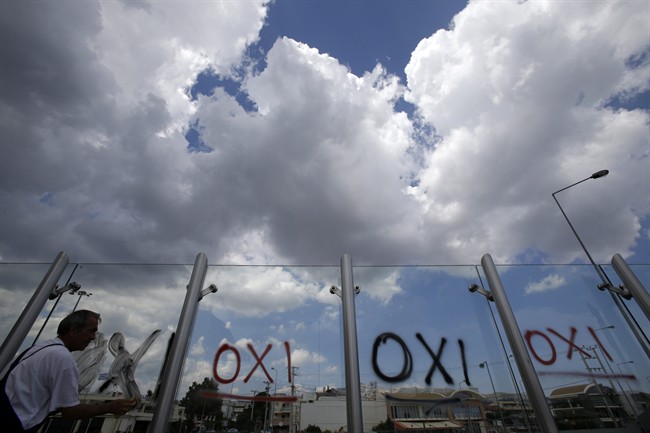 The Latest: Cyprus could agree to write off Greek debt if part of Eurogroup decision | iNFOnews.ca CP33645982