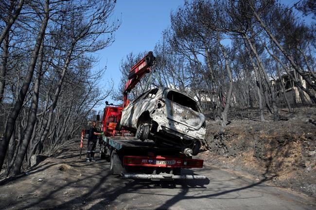 Heartbreak: Funerals begin for Greece's wildfire victims | iNFOnews.ca