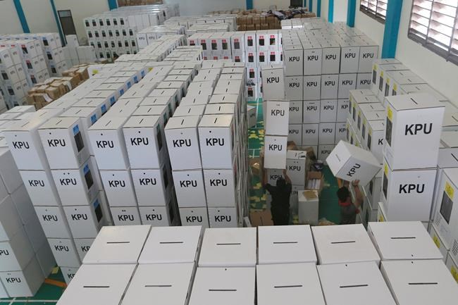 Indonesians wrestle with voting choices and giant ballots | iNFOnews.ca