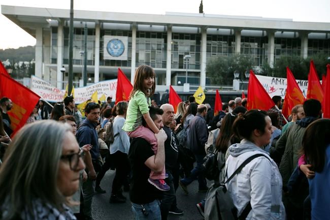 In Greek city, Syrian refugees line up - to get arrested | iNFOnews.ca