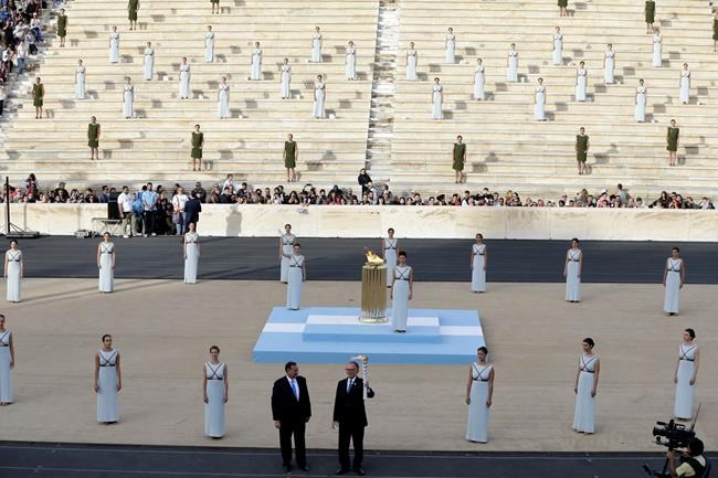 Rio gets Olympic flame 100 days before games | iNFOnews.ca