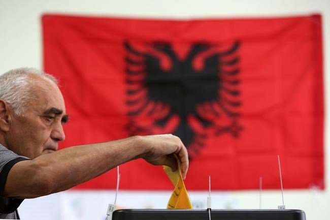 Albanians vote with no trouble after fears of poll clashes | iNFOnews.ca CP1640219275