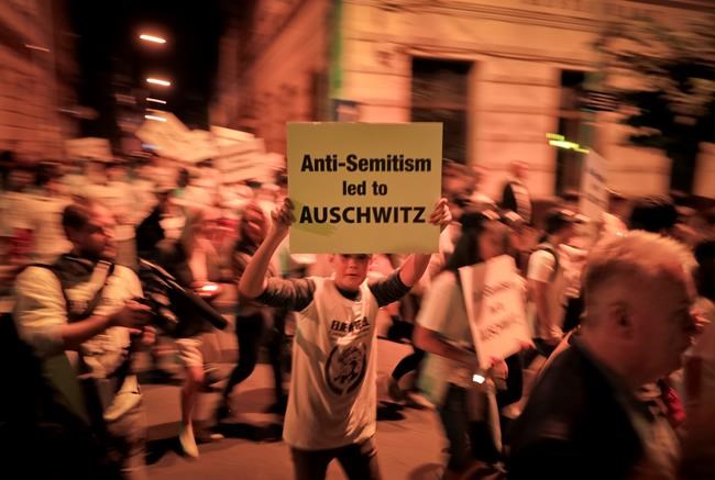 Hundreds march in Romania to honour Holocaust survivor Wiesel | iNFOnews.ca Hundreds march in Romania to honour Holocaust survivor Wiesel | iNFOnews.ca