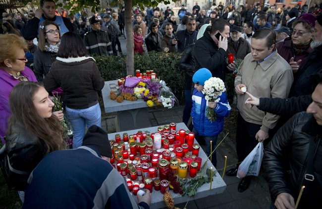 Romania buries hero of nightclub fire as more than 20,000 protest against government | iNFOnews.ca CP35183508