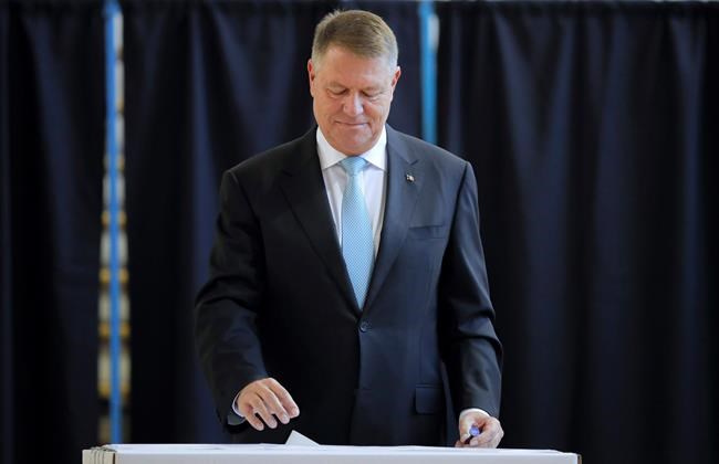 The Latest: Exit polls see runoff in Romania president vote | iNFOnews.ca The Latest: Exit polls see runoff in Romania president vote | iNFOnews.ca