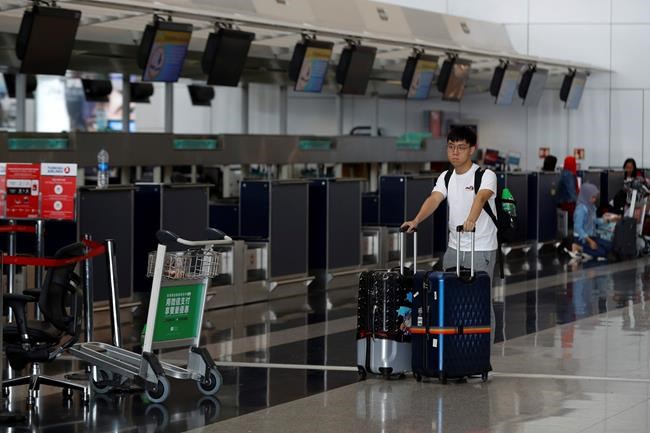 The Latest: Hong Kong police arrest 5 in airport violence | iNFOnews.ca The Latest: Hong Kong police arrest 5 in airport violence | iNFOnews.ca