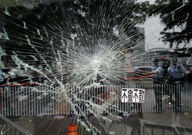 China backs Hong Kong chief, slams protesters for violence | iNFOnews.ca
