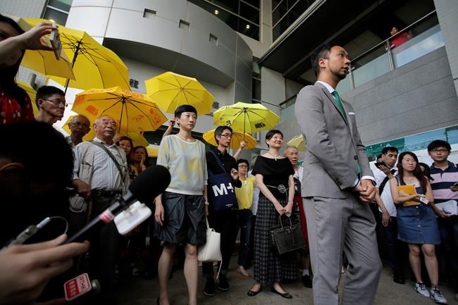 Hong Kong activist beaten by police sentenced to prison | iNFOnews.ca