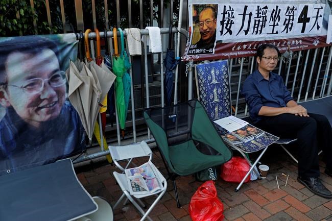 Friends of China Nobel laureate risk safety to show support | iNFOnews.ca CP477924783