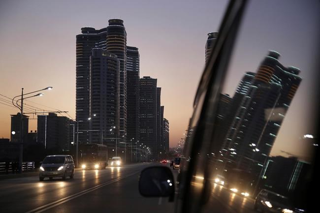 Image of Asia: Reflections at dusk in Pyongyang | iNFOnews.ca Image of Asia: Reflections at dusk in Pyongyang | iNFOnews.ca
